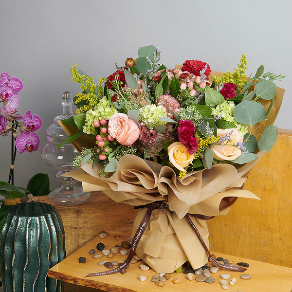 Batch of Green Hydrangeas, Pearl Finesse Roses, Aster, and Mums with Seeded Eucalyptus and Lemon Leaves greeneries.