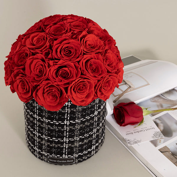 Bouquet of 36 preserved red roses.