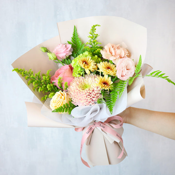 Bouquet of flowers made up of whatever's in season right now. Arrangements vary.