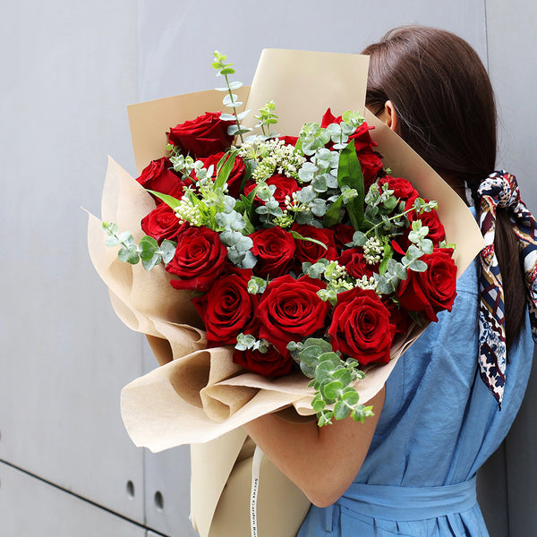 Bouquet of Premium Red Freedom Roses with Eucalyptus greeneries.